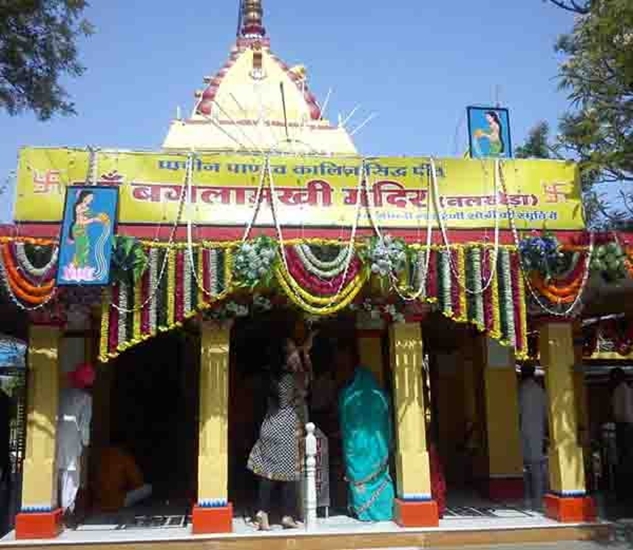 पृथ्वीलोक में माता बगलामुखी तीन स्थानों पर विराजमान है, जो दतिया (मध्यप्रदेश), कांगड़ा (हिमाचल) तथा नलखेड़ा (मध्यप्रदेश) में हैं। नलखेड़ा में तीन मुखों वाली त्रिशक्ति माता बगलामुखी का मंदिर लखुंदर नदी के किनारे स्थित है। ऐसी मान्यता है कि मध्य में मां बगलामुखी, दाएं मां महालक्ष्मी और बाएं मां सरस्वती विराजमान हैं। मां बगलामुखी का त्रिशक्ति स्वरूप में मंदिर भारत में और कहीं नहीं है। द्वापर युगीन यह मंदिर अत्यंत चमत्कारिक है।