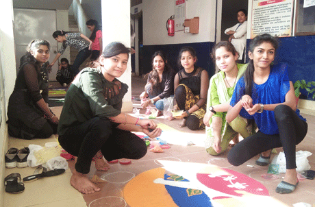 Students of MJ College of Pharmacy make rangoli on the occasion of Pharmacy Week