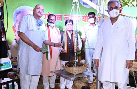 Godhan yojana starts in Chhattisgarh, CM buyes 48 kgs of dung