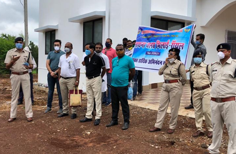 Sanitizer and mask to police personnel