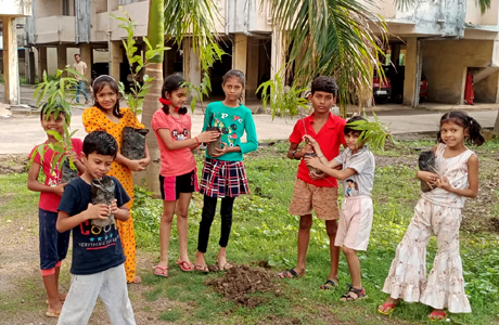Kids plant trees in Anand Vihar Colony