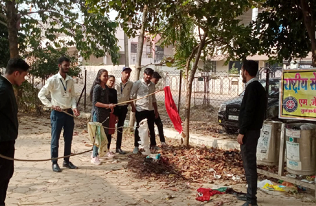 MJ College NSS students clean pond on Pollution Control Day