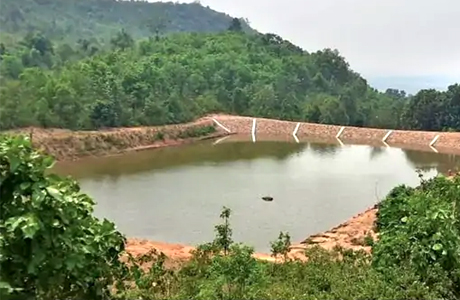 Villagers make a pond on hilltop