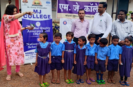 MJ College distributes sandals to primary students