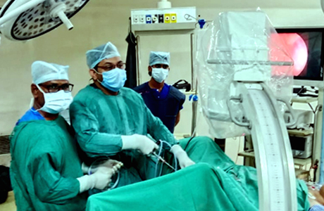 Acute Hematuria, Dozens of clots evacuated from patients bladder