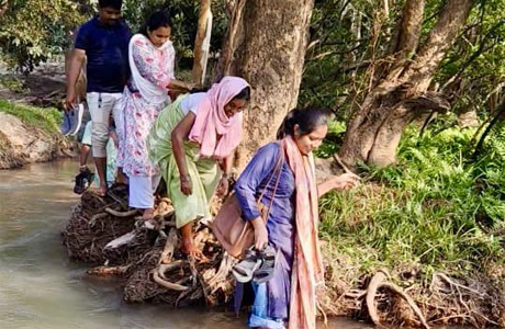 CWC team crosses streams on foot to stop child marriage in Sukma